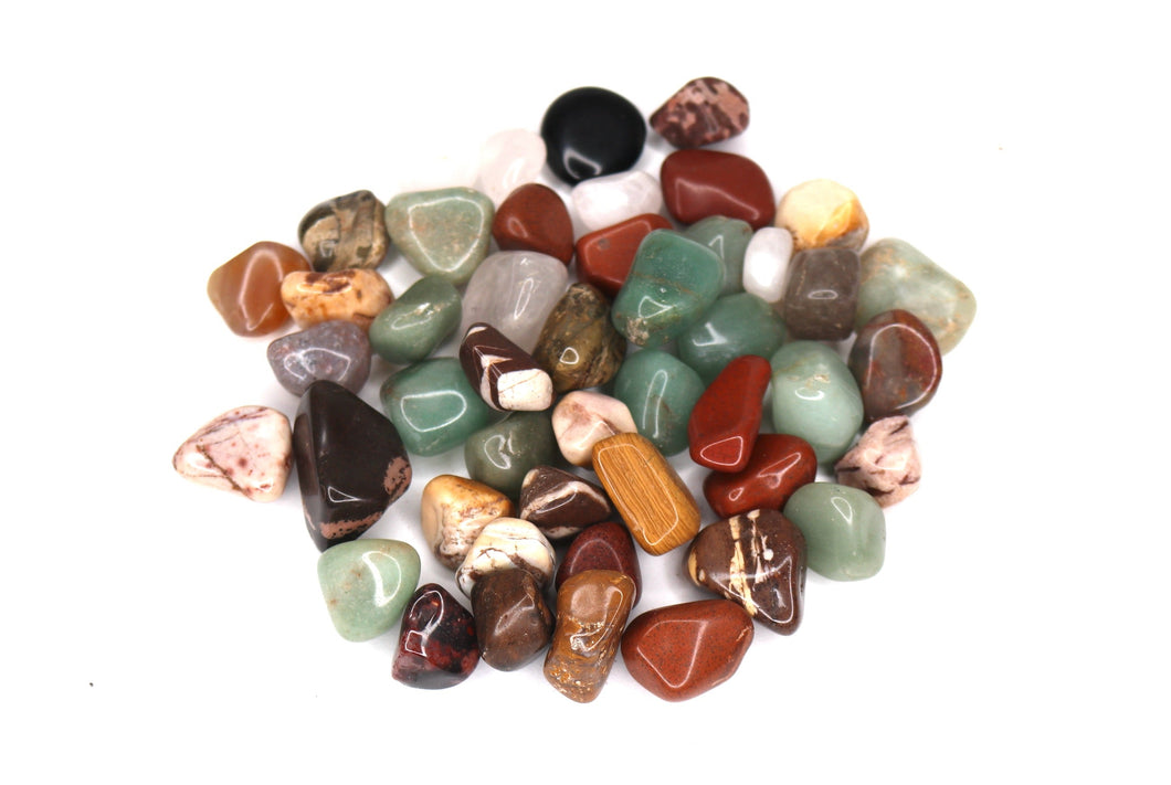 Assorted small stones on a white background